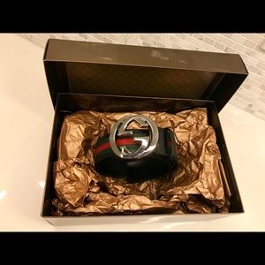 Men’s Gucci web belt with interlocking G buckle